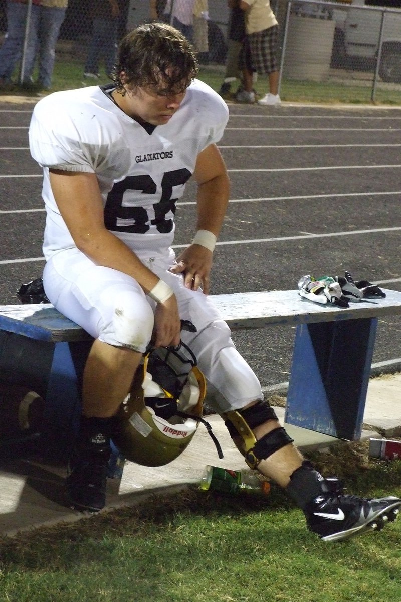 Image: Trent Morgan — Trent Morgan rests his leg.