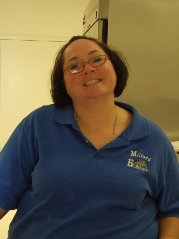 Image: Winona Crumpton — Milford Highschool Cheer Coach, Winona Crumpton helps with the fundraiser.