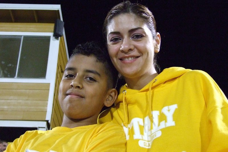 Image: Palmer vs Italy — Li Drago and son, Manuel Gonzales, are from Houston escaping Hurricane Ike.  Ms. Drago said, “Italy sounded like a nice town to stay in and it is!” Manuel is in 6th grade in Houston schools.
