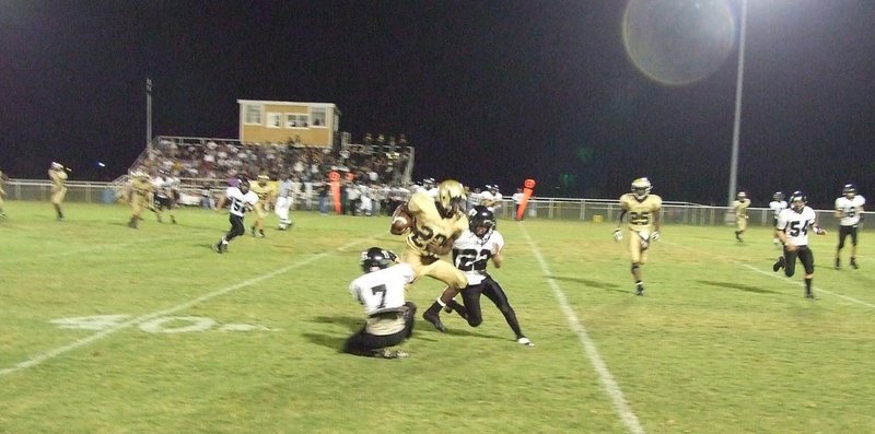 Image: Palmer vs Italy — Desmond Anderson runs for the score.