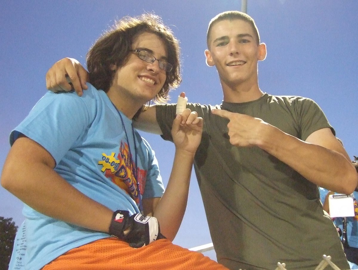 Image: Palmer vs Italy — Trevor Davis and Italy alumni, Michael Mitchell, worry about the injured finger.