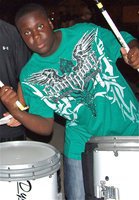 Image: Reed rocks — Adrian Reed helps keep the beat.