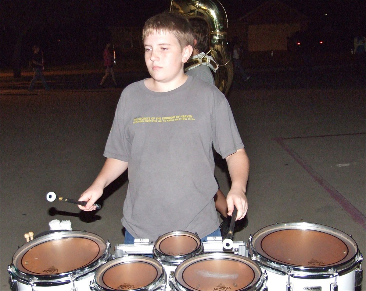 Image: Brett bangs away — Brett Kirton rattled the neighborhood roadways during rehearsal.