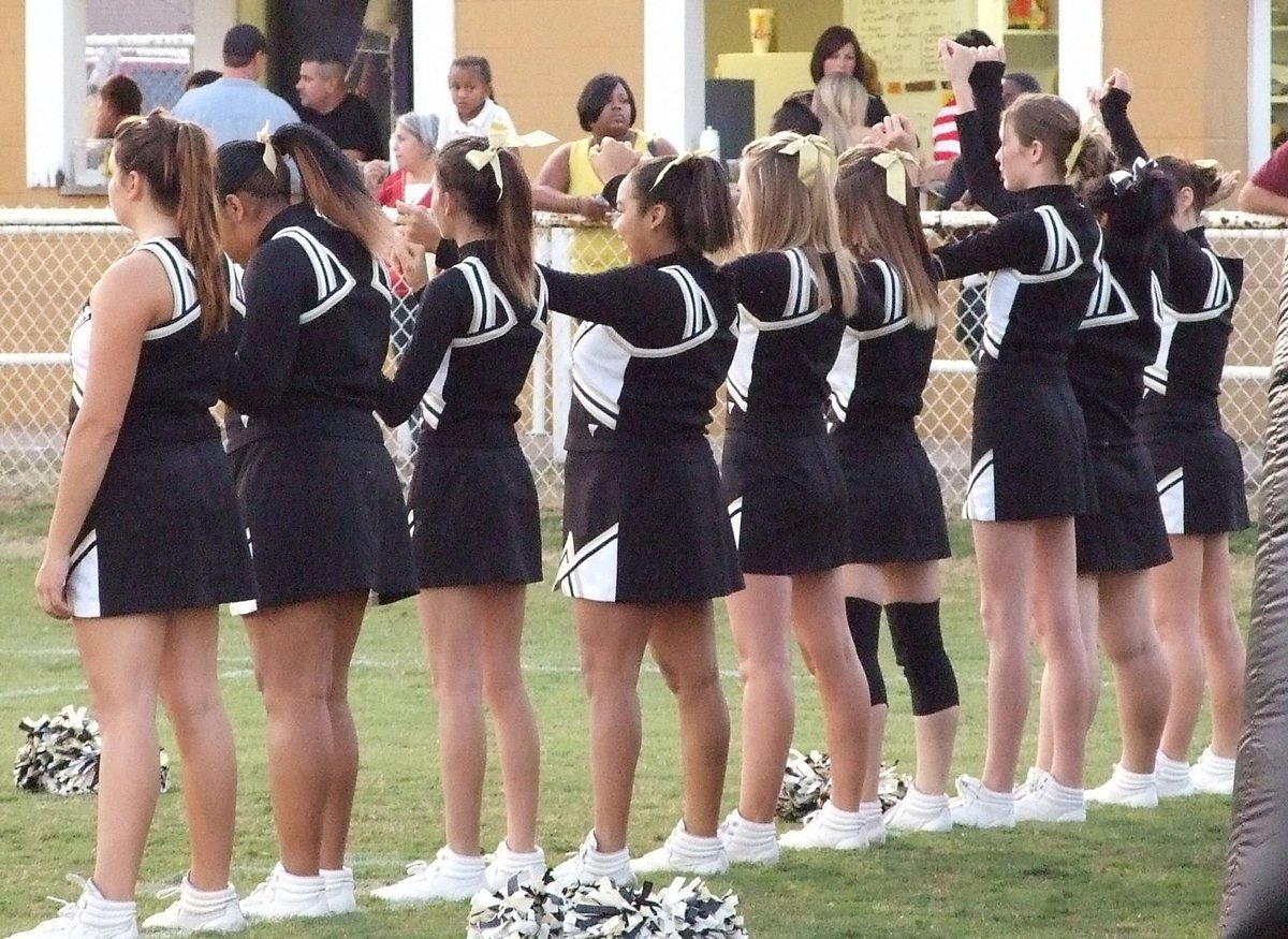 Image: Cheerleaders — IHS Gladiators rev up the crowd.