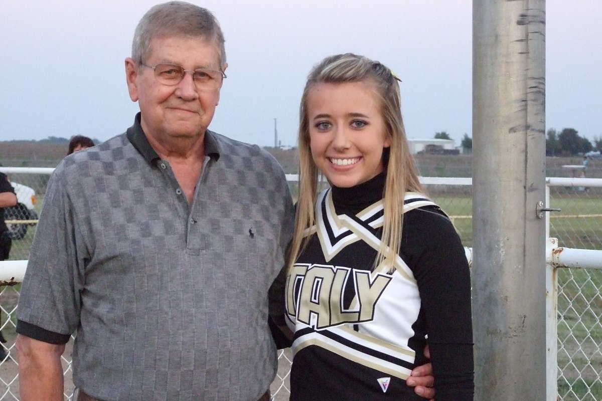 Image: Miller and Granddaughter — Jackie Miller, Sr was recognized for his years of service in the Air Force. From 1952-1957 as ab airborne radio operator and communications security specialist. He is escorted by granddaughter, Lexi Miller.