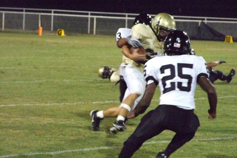 Image: Major gets through — Gladiator, Clay Major, gets through the offense.