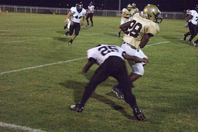 Image: Desmond — Desmond Anderson gains yardage for the Gladiators.