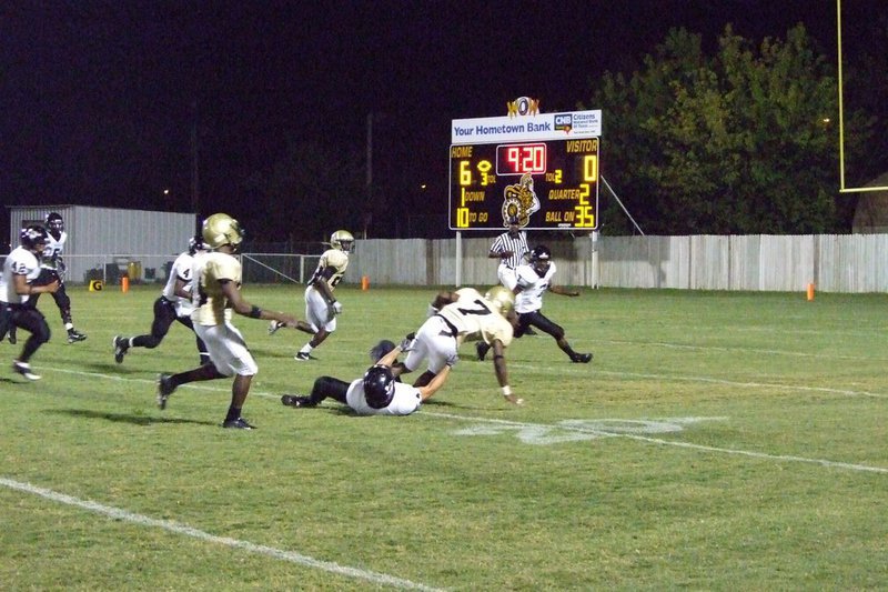 Image: Jasenio plunges — Jasenio Anderson plunges nearer the goal.