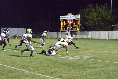Image: Jasenio plunges — Jasenio Anderson plunges nearer the goal.