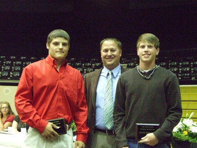 Image: Coach Ward awarded Ethan Simon Offensive MVP and Justin Buchanan Defensive MVP in baseball.