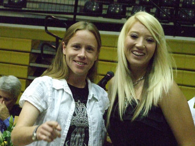 Image: Coach Reeves awards Megan Richards the Nancy Ferguson Carter Award.