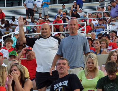 Image: Also on hand to support Jasenio Anderson during the Victory Bowl are Italy Gladiators’ head football coach, Craig Bales, and defensive coordinator, Jeff Richters.