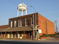 Image: The previous community center watched over by the Italy water tower.