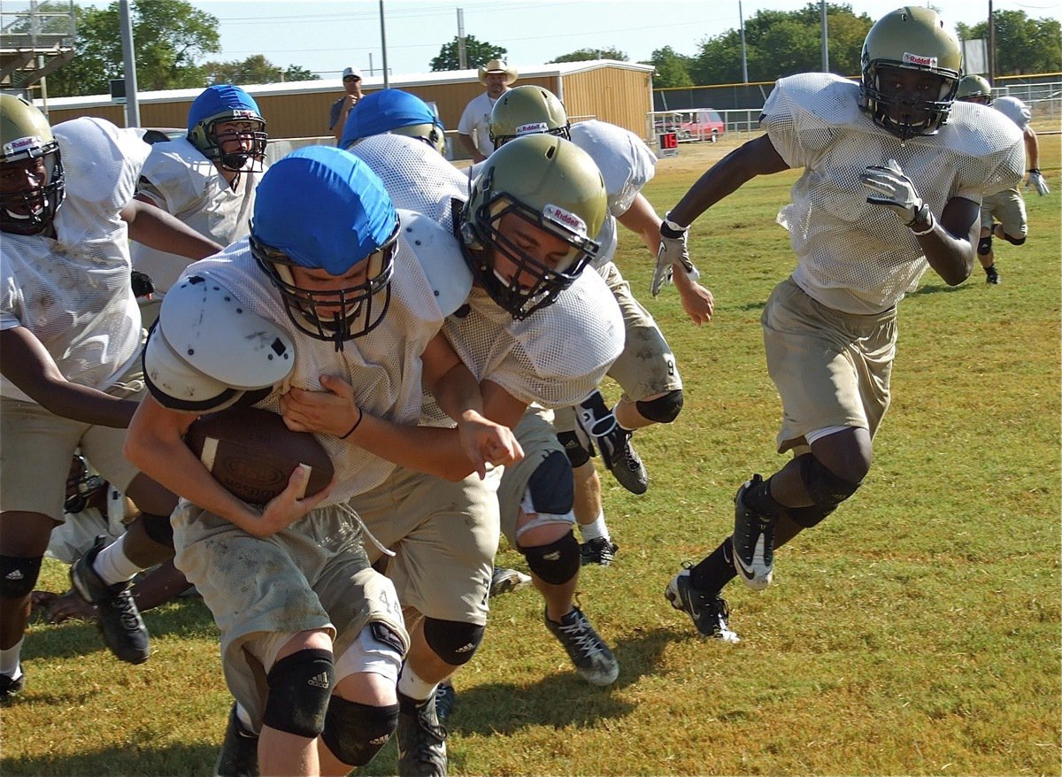 Image: Brandon Souder meets Justin Wood in the backfield.