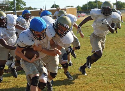 Image: Brandon Souder meets Justin Wood in the backfield.