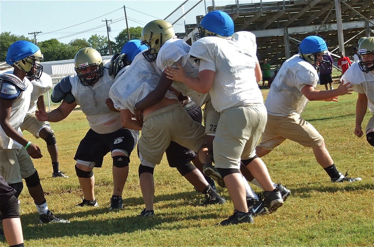 Image: Larry Mayberry, Jr. locates the running back.