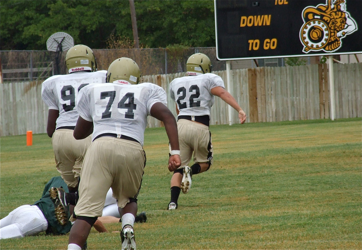 Image: On the second play of the scrimmage Italy’s Kyle Jackson(22) breaks thru the middle of the Valley Mills defense for a 68-yard score.