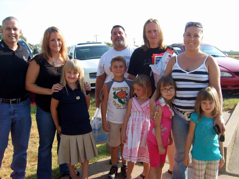 Image: These families are ready for school to start.