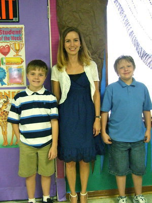 Image: Daniel Grimes, Carroll Grimes (fifth grade teacher) and Cole Holley are ready for the fifth grade to start. Carroll Grimes teaches small groups, special education and elementary physical education
