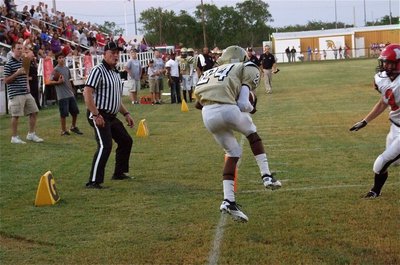 Image: Gladiator sophomore Eric Carson(24) catches a sideline pass for the first touchdown of the game.