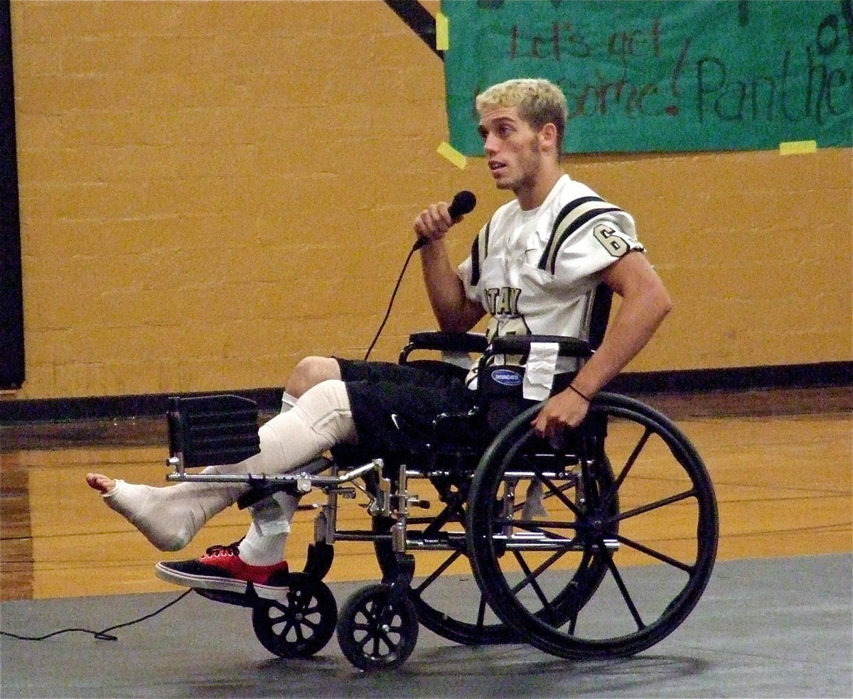 Image: Senior Brandon Souder(63) addresses the IHS student body during the pep rally before the big hunt for the Mart Panthers begins.