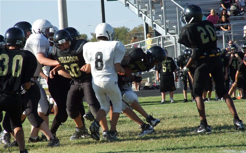 Image: Italy catches the Bulldog’s in their backfield for a loss of yards.