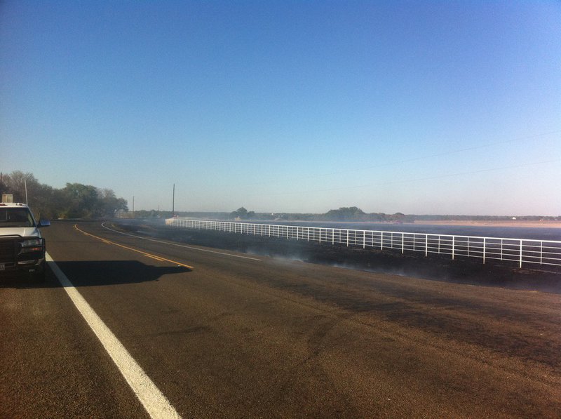 Image: The fire burned several acres along the corner of Highway 77 and Kinfolk Lane outside Italy.
