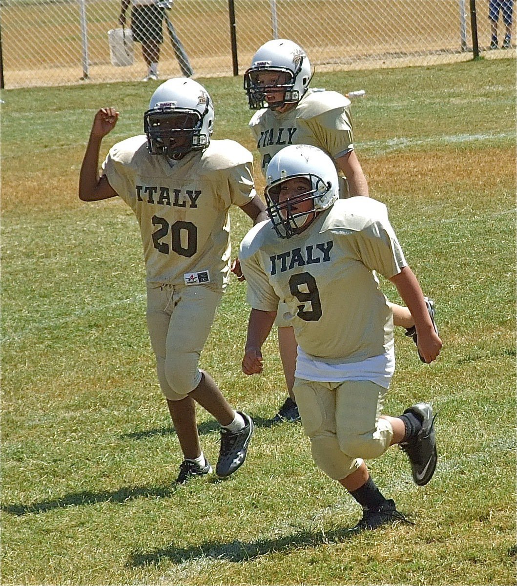 Image: Members of the IYAA A-Team begin to celebrate their opening day win.