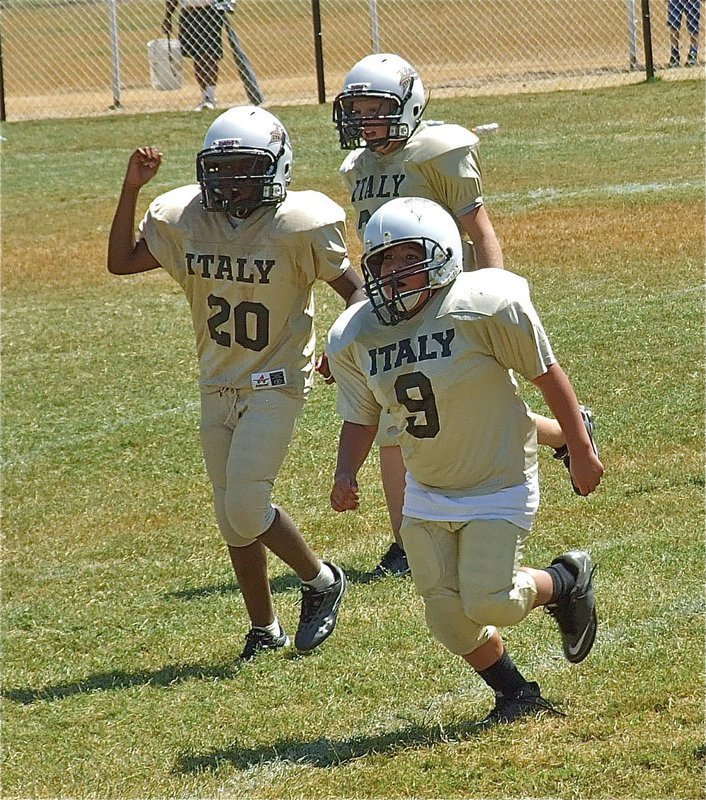 Image: Members of the IYAA A-Team begin to celebrate their opening day win.