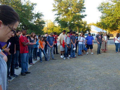 Image: A moment of prayer with Michael Chambers (Italy First Baptist Church Youth Pastor, Italy VFD Fireman and Italy ISD staff member) leading the prayer.