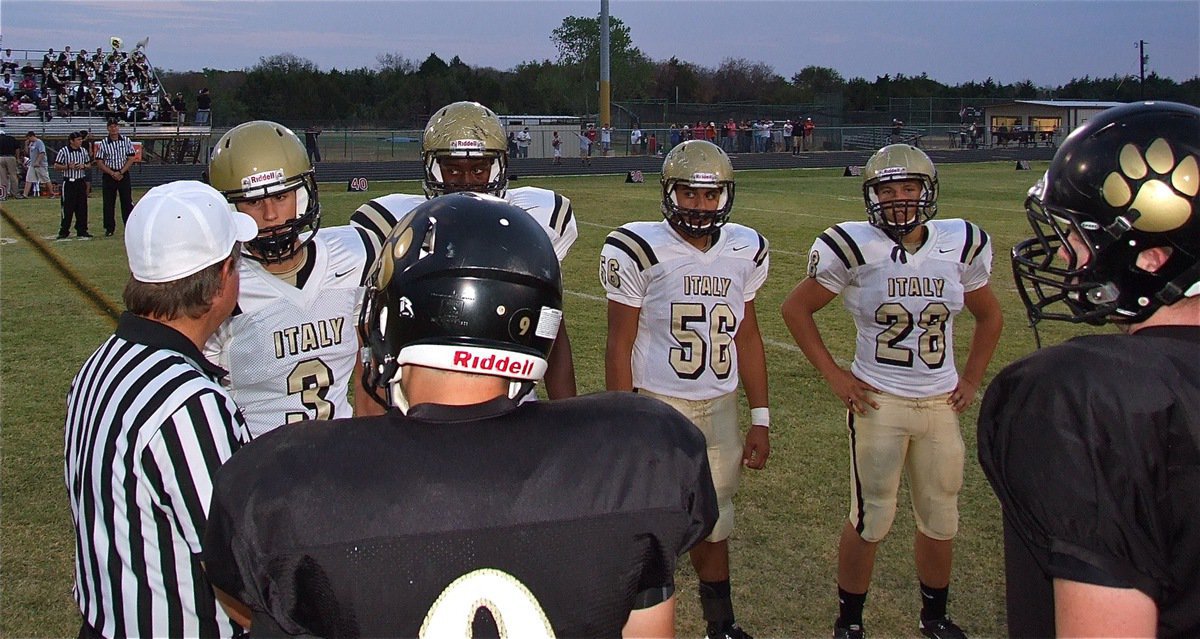 Image: Gladiator captains Jase Holden(3), Larry Mayberry, Jr.(77), Omar Estrada(56) and Kyle Jackson(28) await the coin toss at midfield.