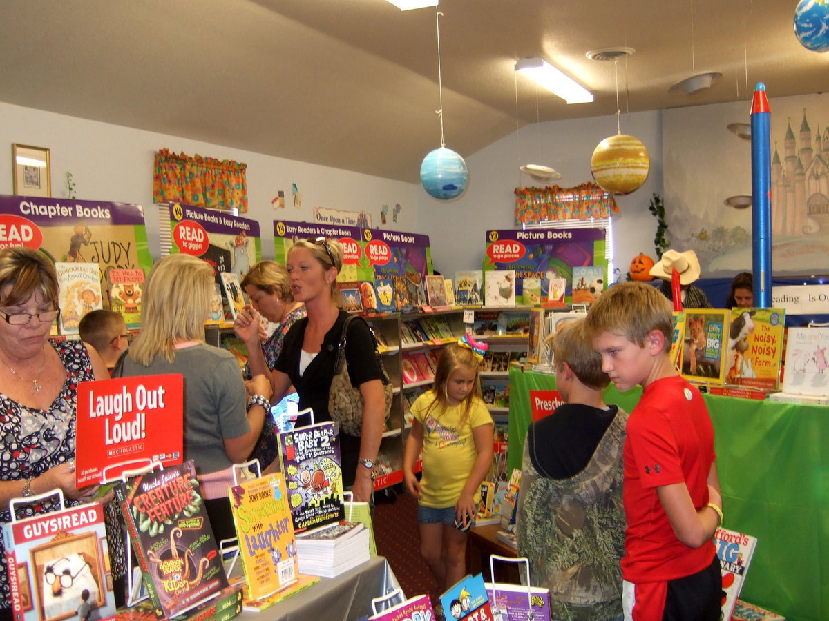 Image: More kids and more books.