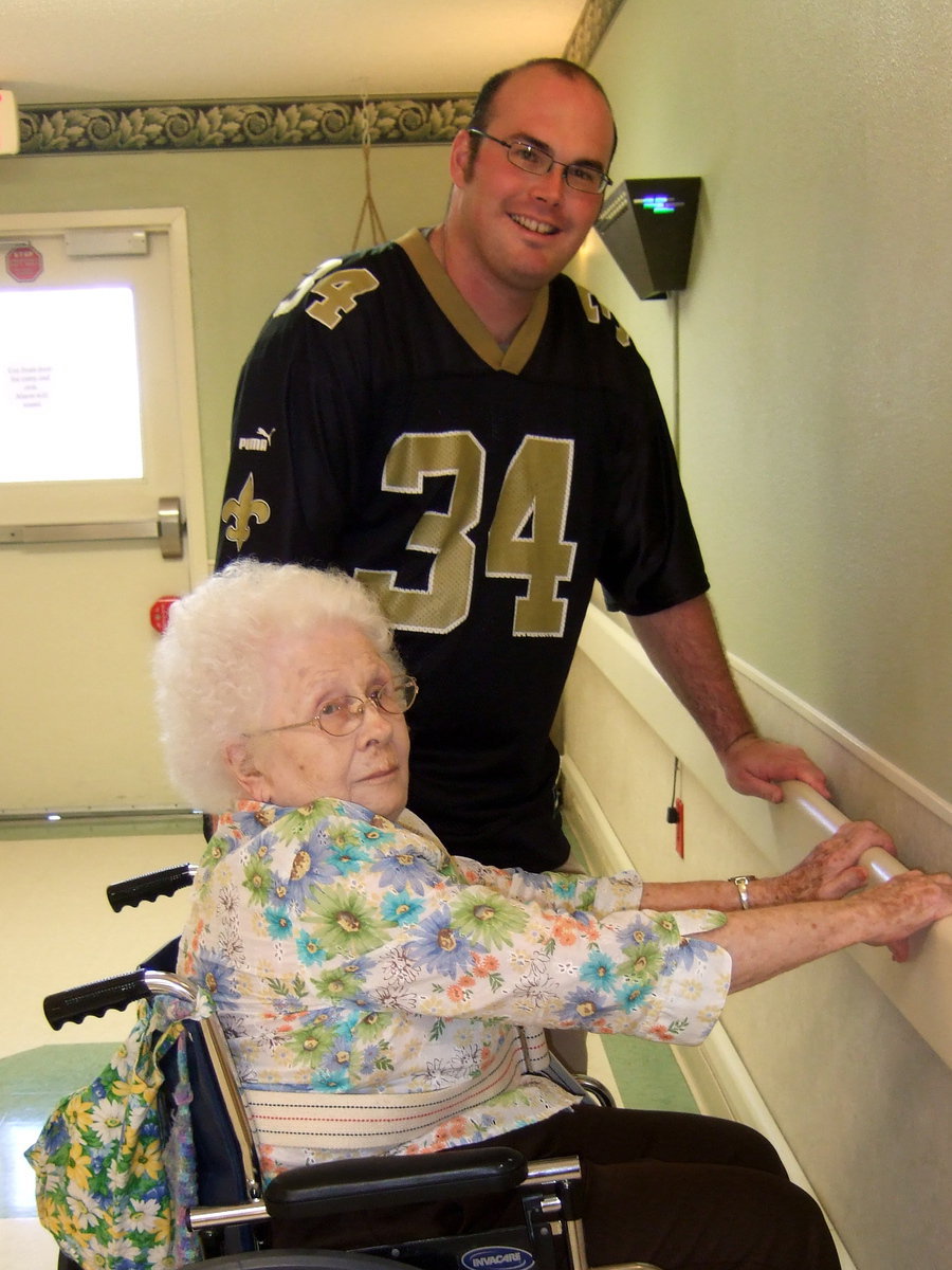 Image: Therapist at working wearing his favorite jersey.