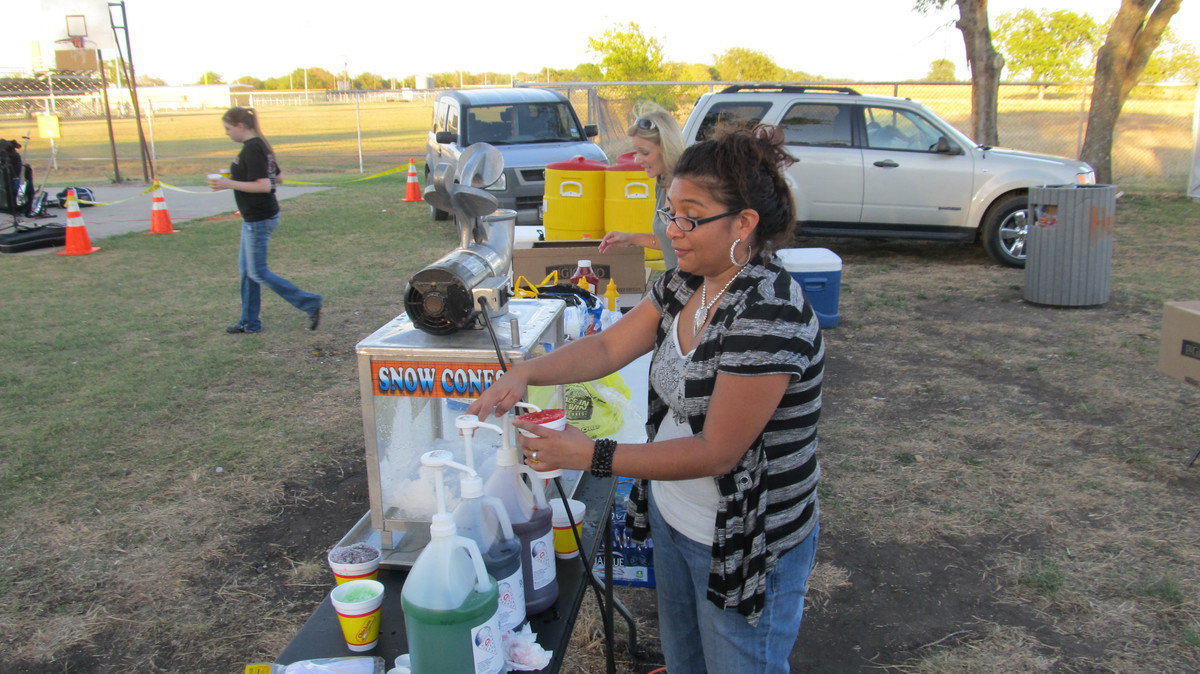 Image: The snow cone stand was preparing for a busy night.