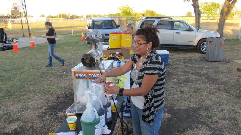 Image: The snow cone stand was preparing for a busy night.
