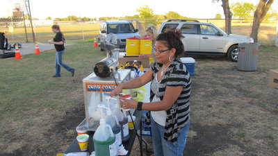 Image: The snow cone stand was preparing for a busy night.