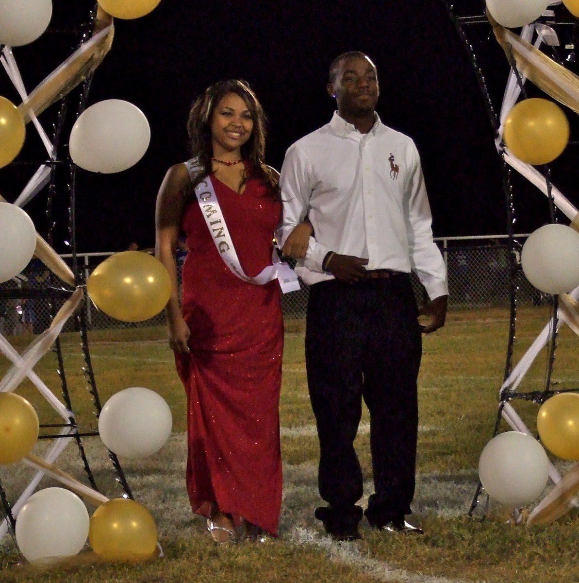 Image: IHS Homecoming Queen nominee Destani Anderson is escorted by Gladiator graduate Desmond Anderson (’10).