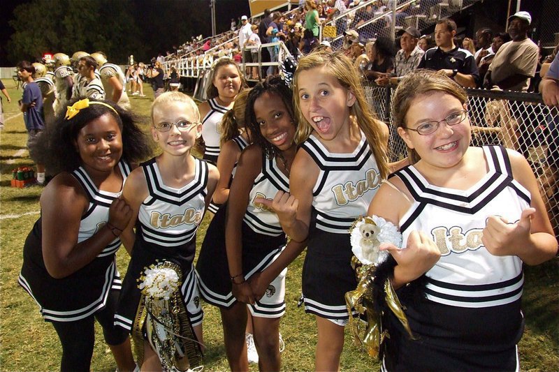 Image: IYAA A-Team Cheerleaders Lajada jackson, Taylor Boyd, Keondra Jackson, Hannah Haight and Carlee Wafer ham it up for the camera after cheering on the sideline.