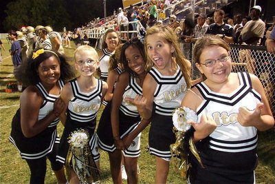 Image: IYAA A-Team Cheerleaders Lajada jackson, Taylor Boyd, Keondra Jackson, Hannah Haight and Carlee Wafer ham it up for the camera after cheering on the sideline.