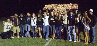 Image: Members of the “Italy Family” joins IHS principal Lee Joffre for a group picture after the closing ceremony.