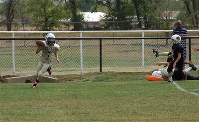 Image: Ryder Itson(7) crosses the goal line during the A-Team Homecoming game against Hubbard.