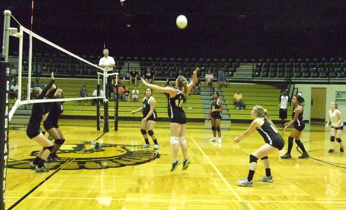 Image: Gladiator JV teammate Paige Westbrook #10 takes control of the ball.