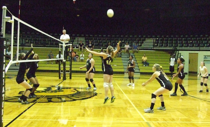 Image: Gladiator JV teammate Paige Westbrook #10 takes control of the ball.