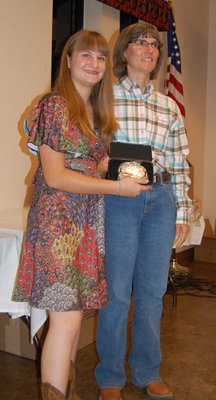 Image: Dakotah Van Huss of Waxahachie, left, won the Champion Walk/Trot Division Buckle. Presented by buckle sponsor Jennifer Alexander of Midlothian’s Goldmyne Ranch. Dakotah is a student at the Flying Dollar Ranch.