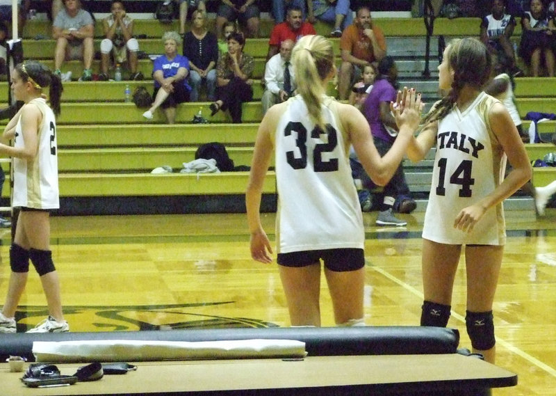 Image: Jozie and Hannah switch places. It’s time to serve.