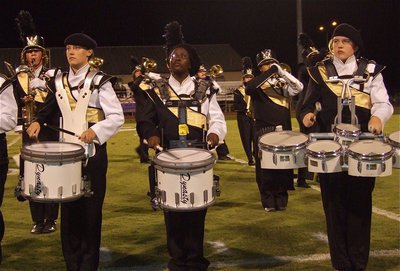 Image: Whitney Wolaver, Brenya WIlliams and Brett Kirton help deliver, “The Beat of Champions.”