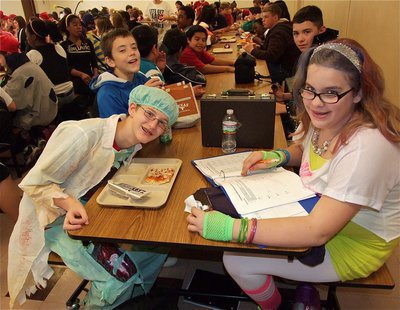 Image: Dr. Hunter Ballard confirms the cafeteria food is actually dead while Christy Tucker is an old-school hard working student.