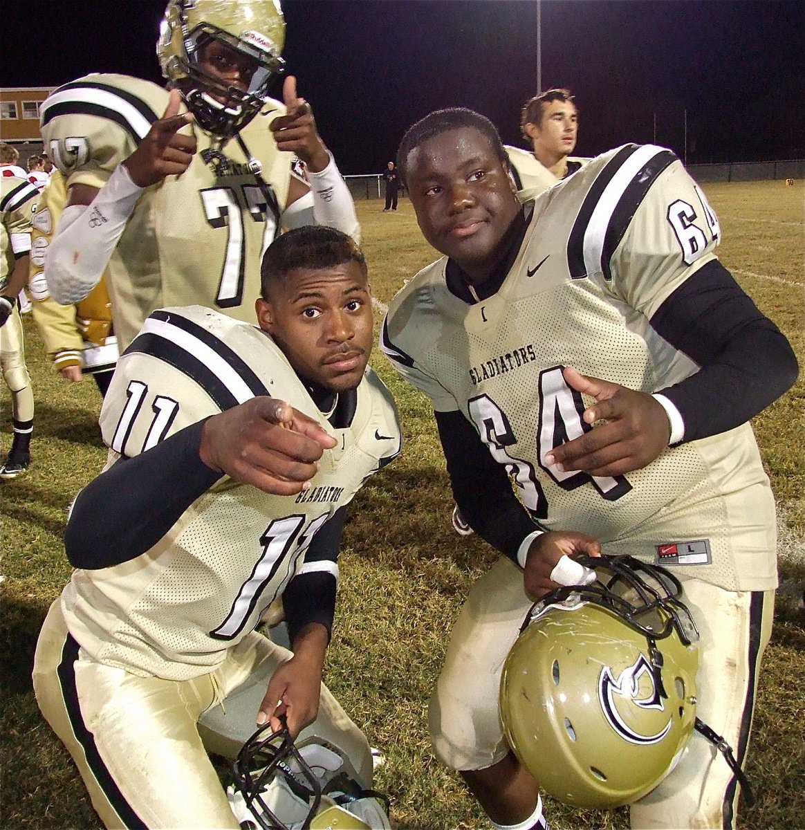 Image: Here’s looking at you! Larry Mayberry, Jr.(77), Jalarnce Jamal Lewis(11) and Adrian Reed(64) look ahead to the Centerville game after defeating Axtell.