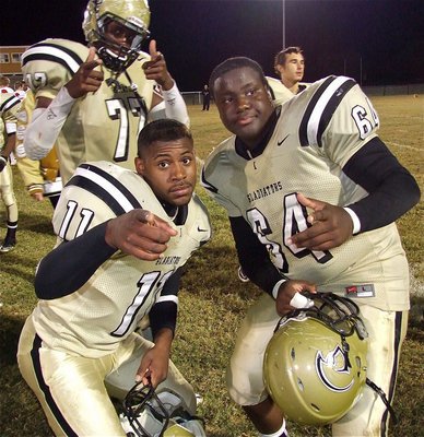 Image: Here’s looking at you! Larry Mayberry, Jr.(77), Jalarnce Jamal Lewis(11) and Adrian Reed(64) look ahead to the Centerville game after defeating Axtell.