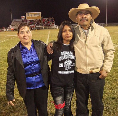 Image: Gladiator Regiment Marching Band member Laura Luna, a senior, is emotional as Italy prepares to play their final home game.